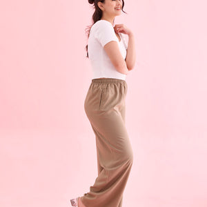 Women Beige Solid Viscose Knit Mid Rise Palazzos