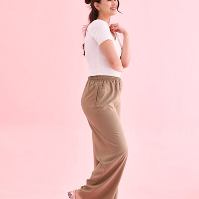 Women Beige Solid Viscose Knit Mid Rise Palazzos