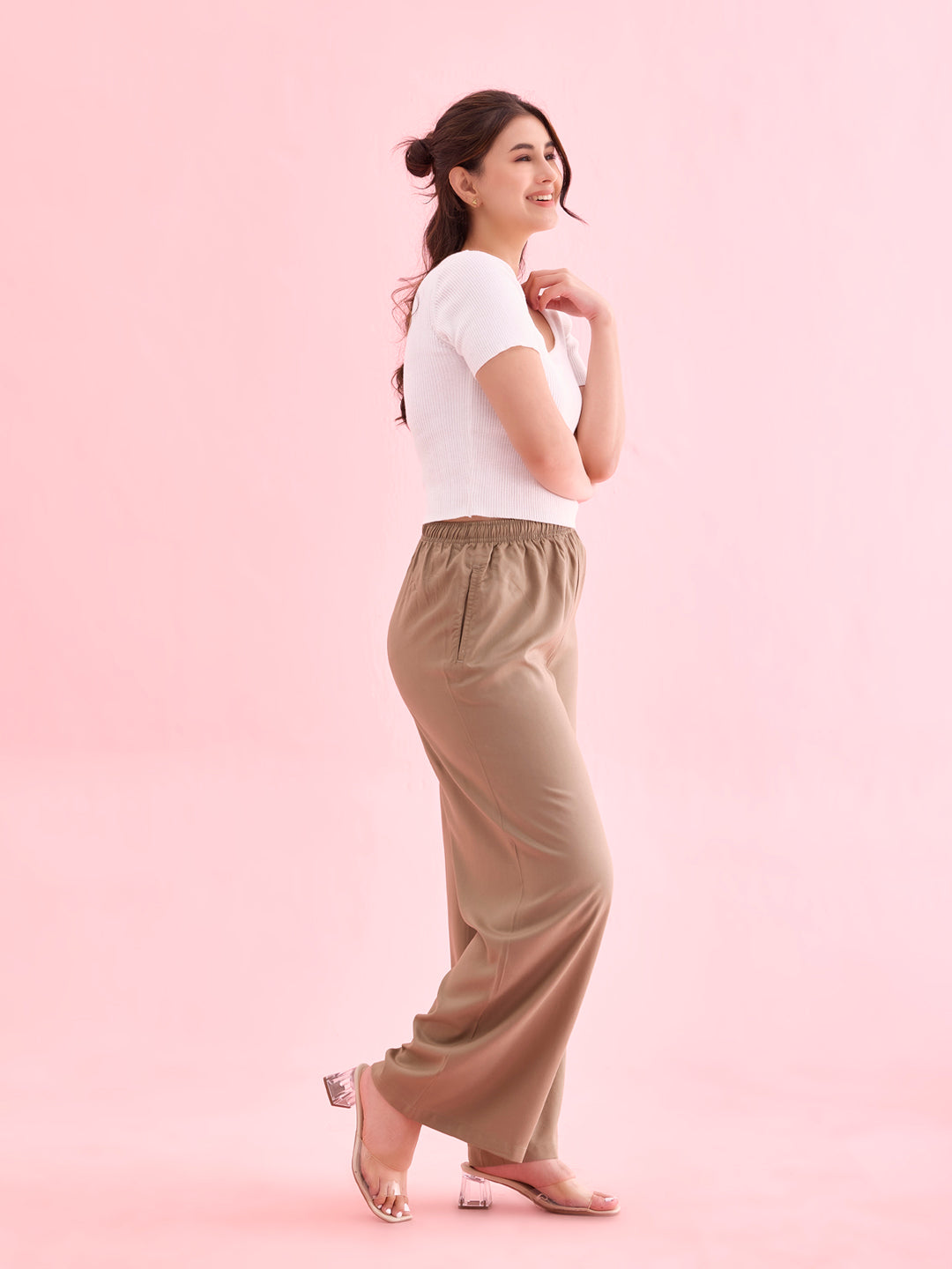 Women Beige Solid Viscose Knit Mid Rise Palazzos