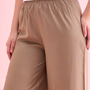 Women Beige Solid Viscose Knit Mid Rise Palazzos