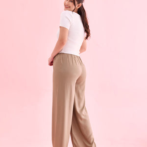 Women Beige Solid Viscose Knit Mid Rise Palazzos
