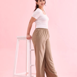 Women Beige Solid Viscose Knit Mid Rise Palazzos