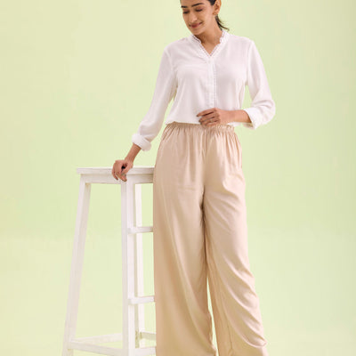 Women Solid Light Beige Woven Viscose Mid Rise Basic Palazzos