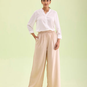 Women Solid Light Beige Woven Viscose Mid Rise Basic Palazzos