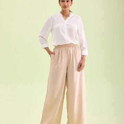 Women Solid Light Beige Woven Viscose Mid Rise Basic Palazzos