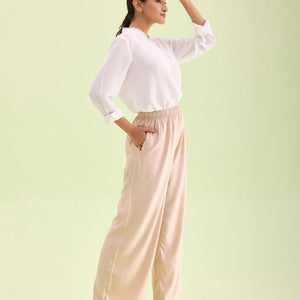 Women Solid Light Beige Woven Viscose Mid Rise Basic Palazzos