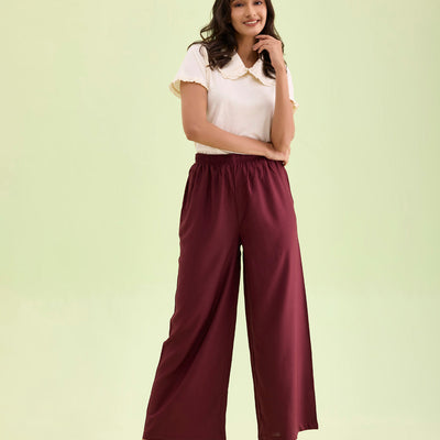 Women Maroon Solid Viscose Knit Mid Rise Palazzos