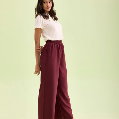 Women Maroon Solid Viscose Knit Mid Rise Palazzos