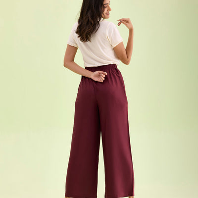 Women Maroon Solid Viscose Knit Mid Rise Palazzos