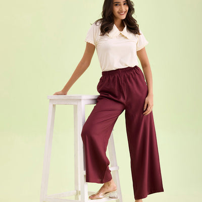 Women Maroon Solid Viscose Knit Mid Rise Palazzos