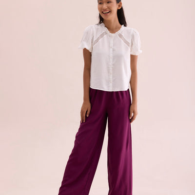Women Medium Violet Solid Viscose Knit Mid Rise Palazzos