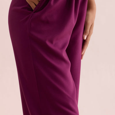 Women Medium Violet Solid Viscose Knit Mid Rise Palazzos