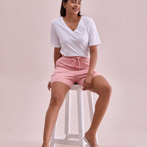Women Solid Baby Pink Mid Rise Casual Shorts