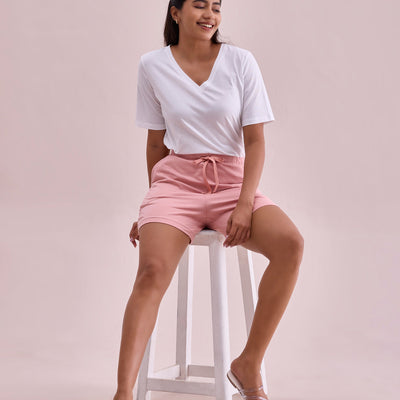Women Solid Baby Pink Mid Rise Casual Shorts
