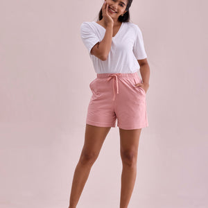 Women Solid Baby Pink Mid Rise Casual Shorts