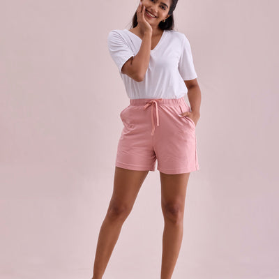 Women Solid Baby Pink Mid Rise Casual Shorts