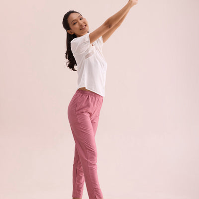 Women Dusty Rose Solid Mid Rise Metallic Pants