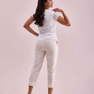 Women Solid Cream Mid Rise Cropped Metallic Pants