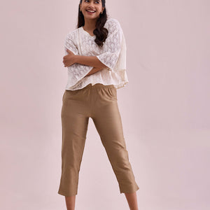 Women Solid Gold Mid Rise Cropped Metallic Pants