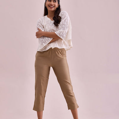 Women Solid Gold Mid Rise Cropped Metallic Pants