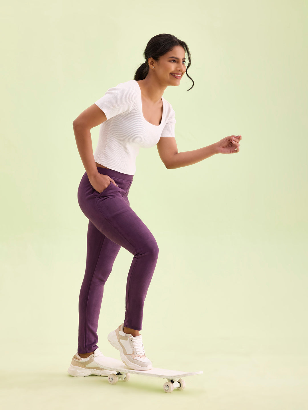 Women Solid Purple Mid Rise Suede Treggings