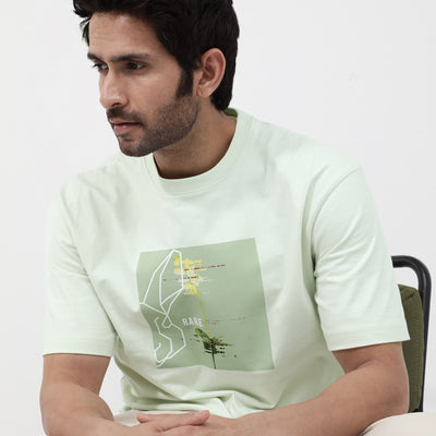 Rare Rabbit Articale Mens Luca Pastel Green Cotton Polyester Fabric Short Sleeve Crew Neck Oversized Fit Graphic Printed T-Shirt