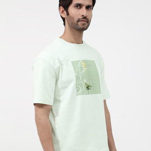 Rare Rabbit Articale Mens Luca Pastel Green Cotton Polyester Fabric Short Sleeve Crew Neck Oversized Fit Graphic Printed T-Shirt