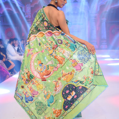 Parrot Green Dual Tone Ardha Chandra Krishna Rasa Leela Hand-Painted Pattachitra Saree (Pre Order)