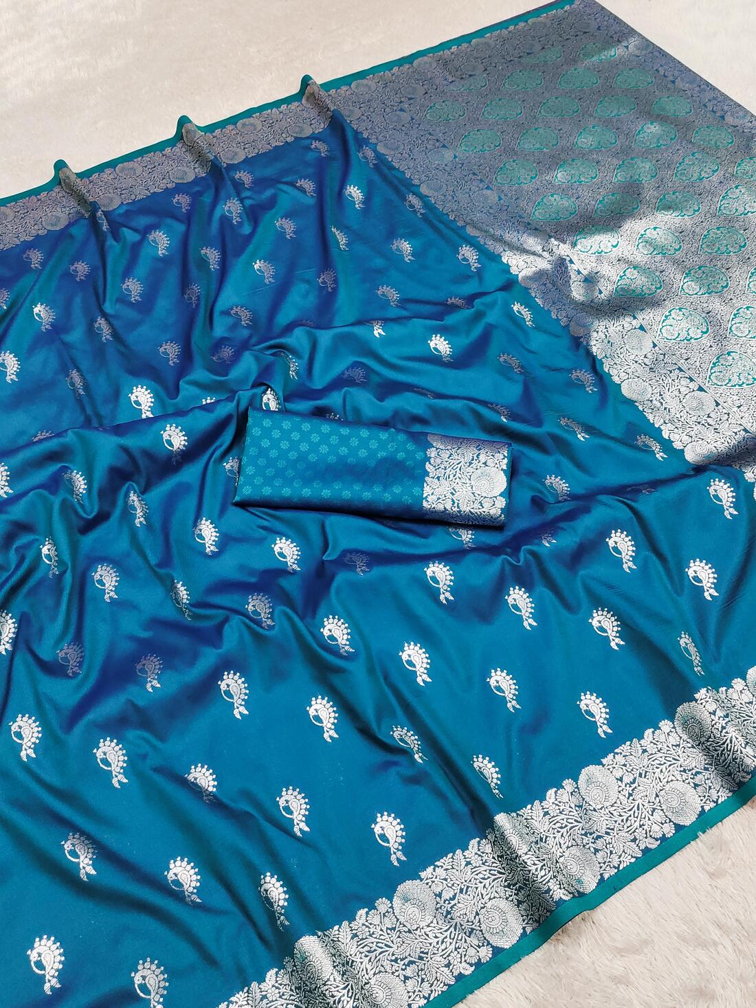 Winsome Firozi Soft Banarasi Silk Saree With Brood Blouse Piece