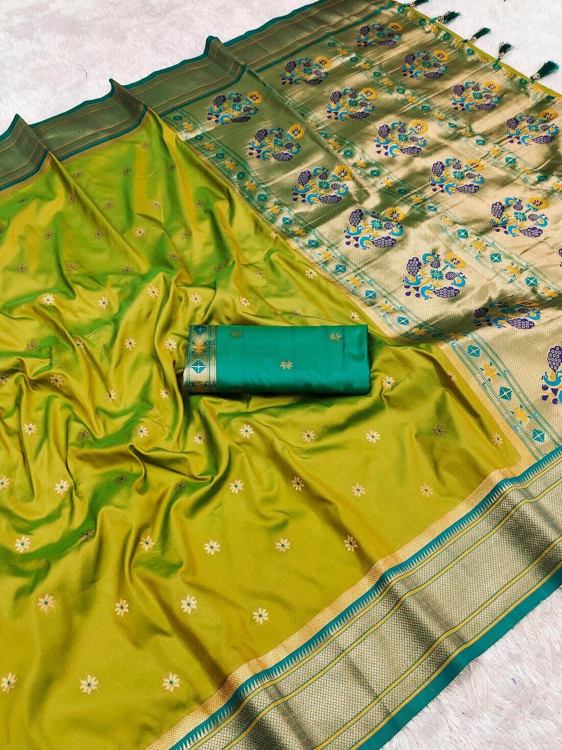 Dazzling Mehndi Paithani Silk Saree With Surreptitious Blouse Piece