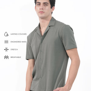 Rare Rabbit Men's Nick Dark Green Cotton Lycra Fabric Cuban Collar Half Sleeves Solid Shirt