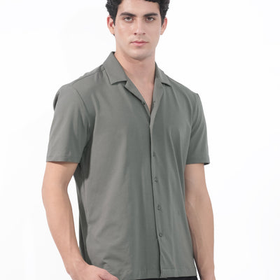 Rare Rabbit Men's Nick Dark Green Cotton Lycra Fabric Cuban Collar Half Sleeves Solid Shirt
