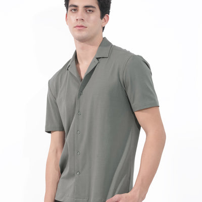 Rare Rabbit Men's Nick Dark Green Cotton Lycra Fabric Cuban Collar Half Sleeves Solid Shirt