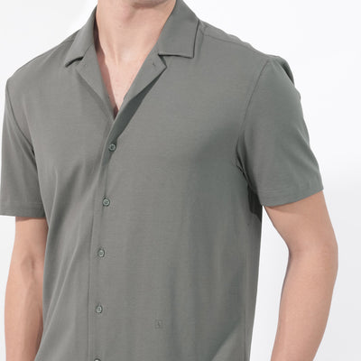 Rare Rabbit Men's Nick Dark Green Cotton Lycra Fabric Cuban Collar Half Sleeves Solid Shirt