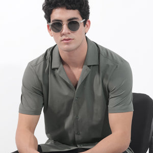 Rare Rabbit Men's Nick Dark Green Cotton Lycra Fabric Cuban Collar Half Sleeves Solid Shirt