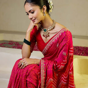 Whimisical Red-Pink Silk Bandhani Saree