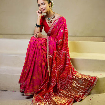 Whimisical Red-Pink Silk Bandhani Saree