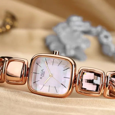 Titan Raga Moments of Joy Mother of Pearl Dial Analog Rose Gold Metal Strap watch for Women 24mm NT95136WM01