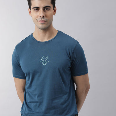 Rare Rabbit Men's Oval Petrol Cotton Fabric Crew Neck Half Sleeves Slim Fit Logo Detailing Solid T-Shirt
