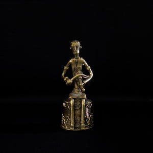 Dhokra - Tribal Musician sitting on base playing Kendra (1 PICES)