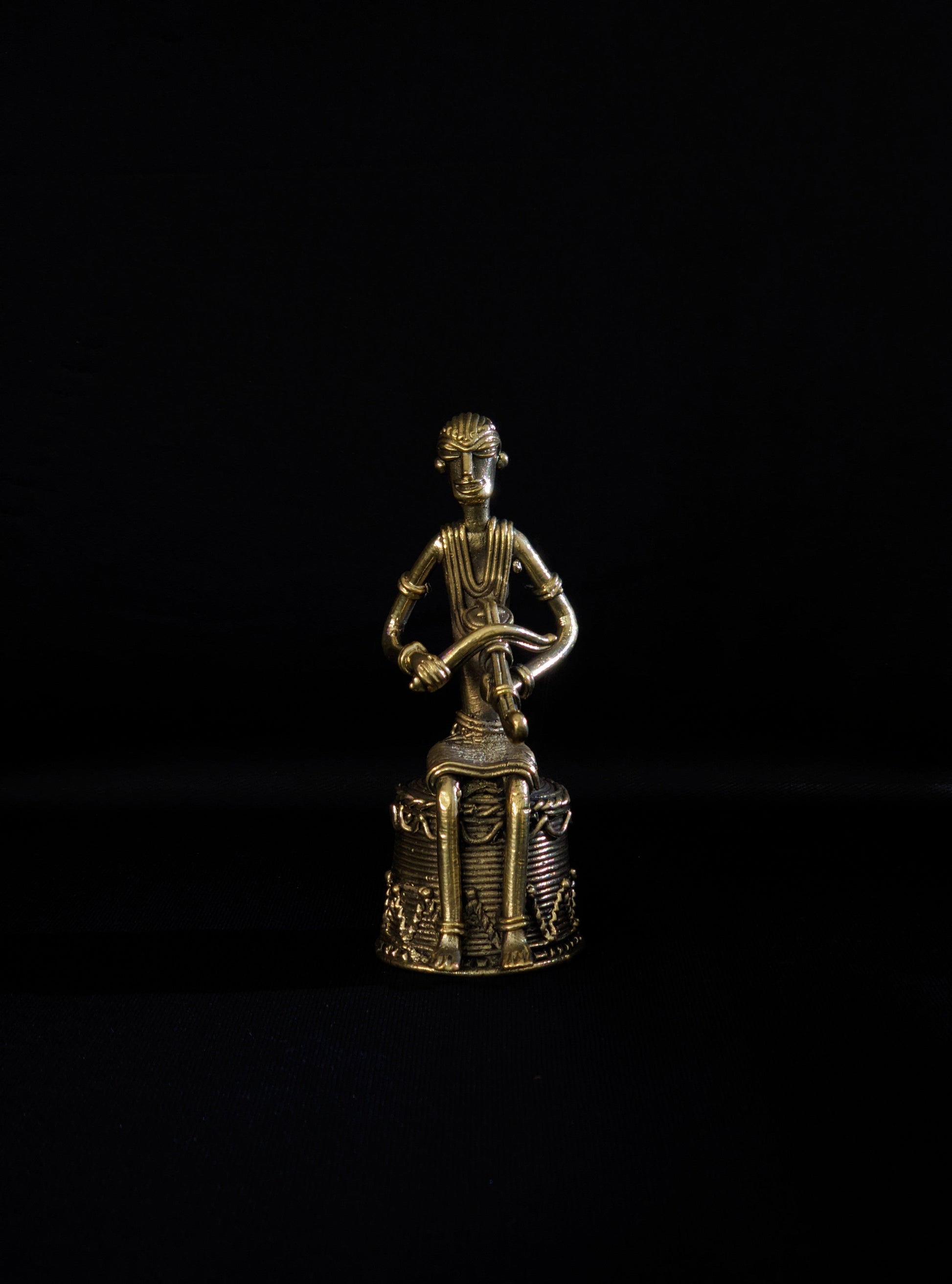 Dhokra - Tribal Musician sitting on base playing Kendra (1 PICES)