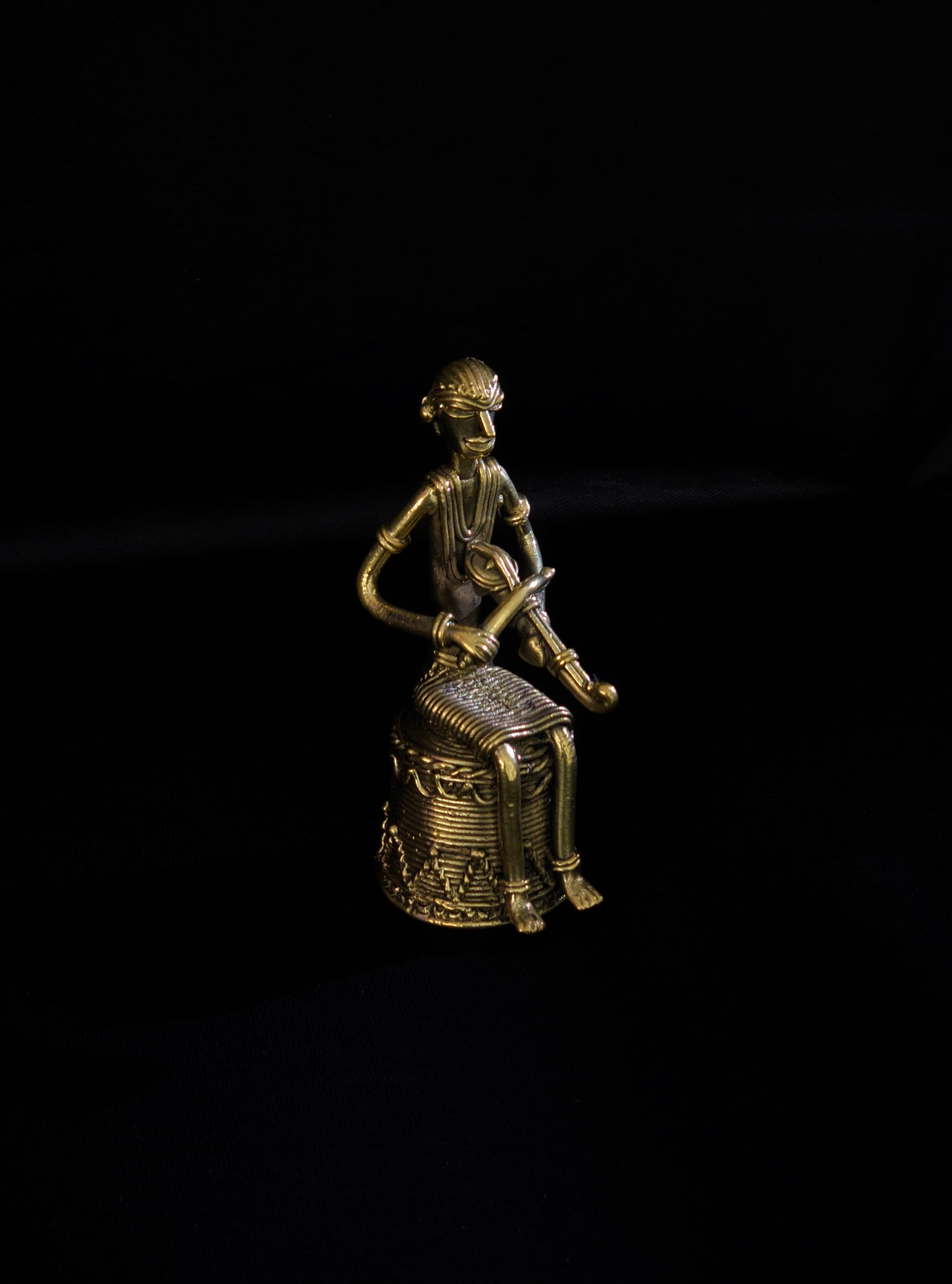 Dhokra - Tribal Musician sitting on base playing Kendra (1 PICES)