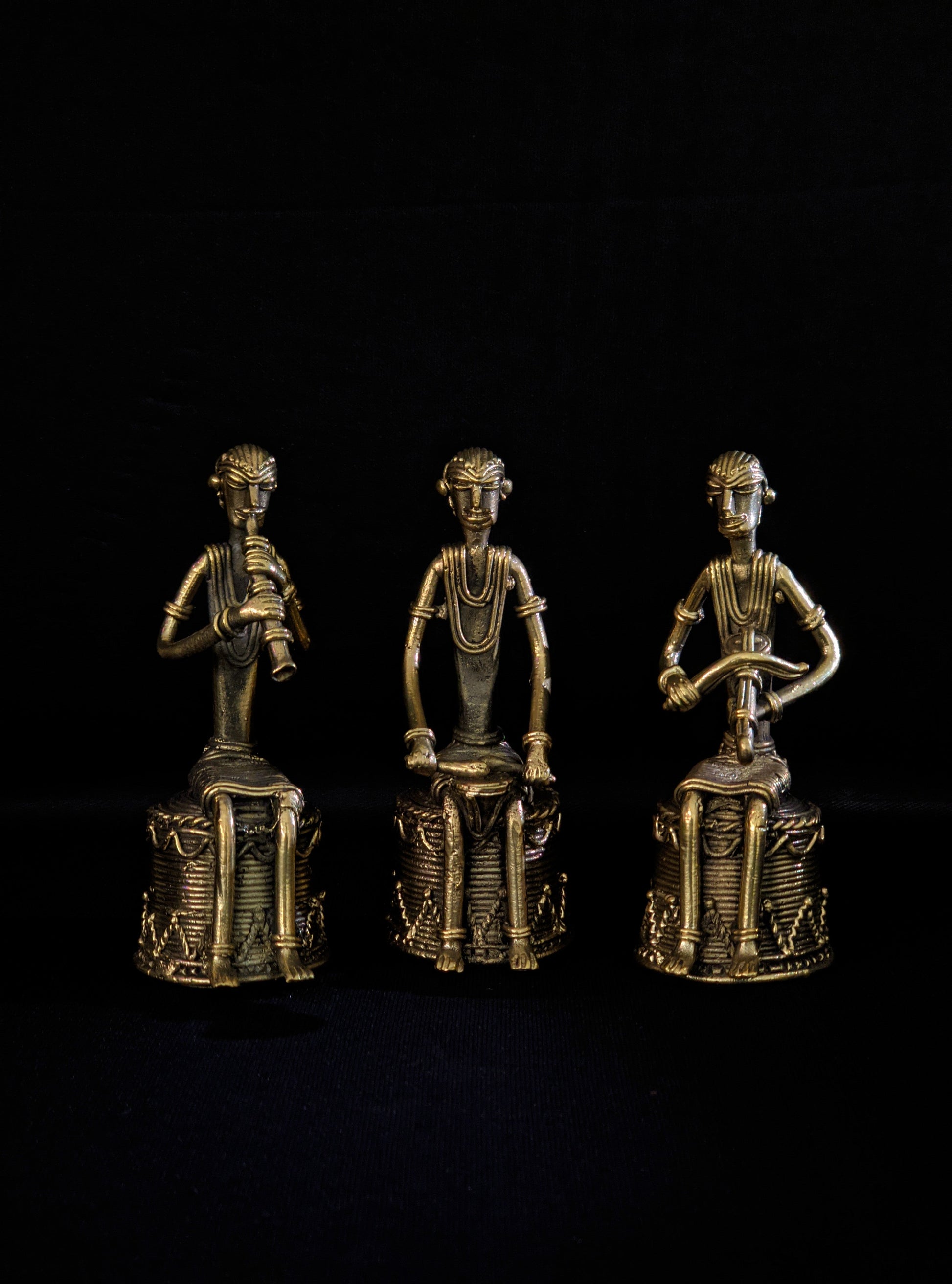 Dhokra - Tribal Musician sitting on base playing Kendra (1 PICES)