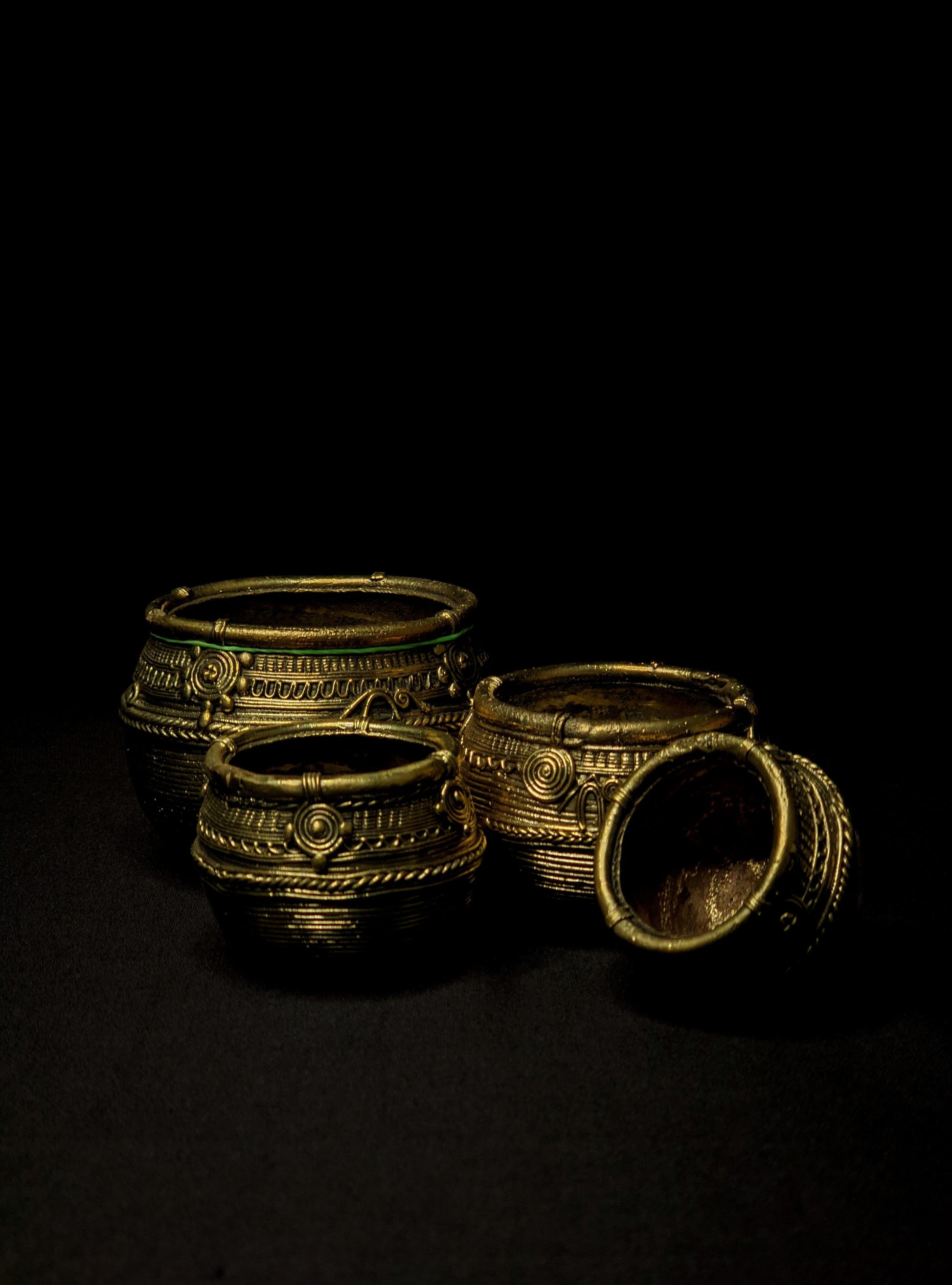Handcrafted Dhokra Mana (Set of 4)
