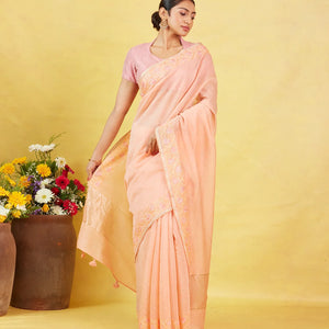 Peach Handwoven Linen Saree Embroidered With Floral Motifs