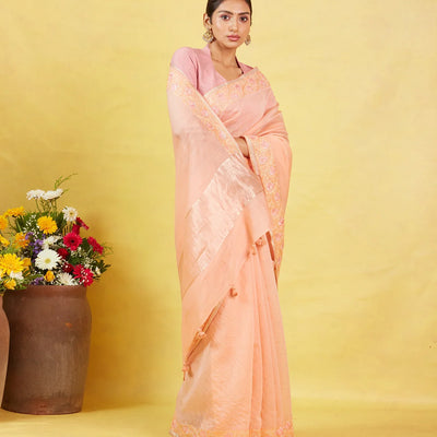 Peach Handwoven Linen Saree Embroidered With Floral Motifs