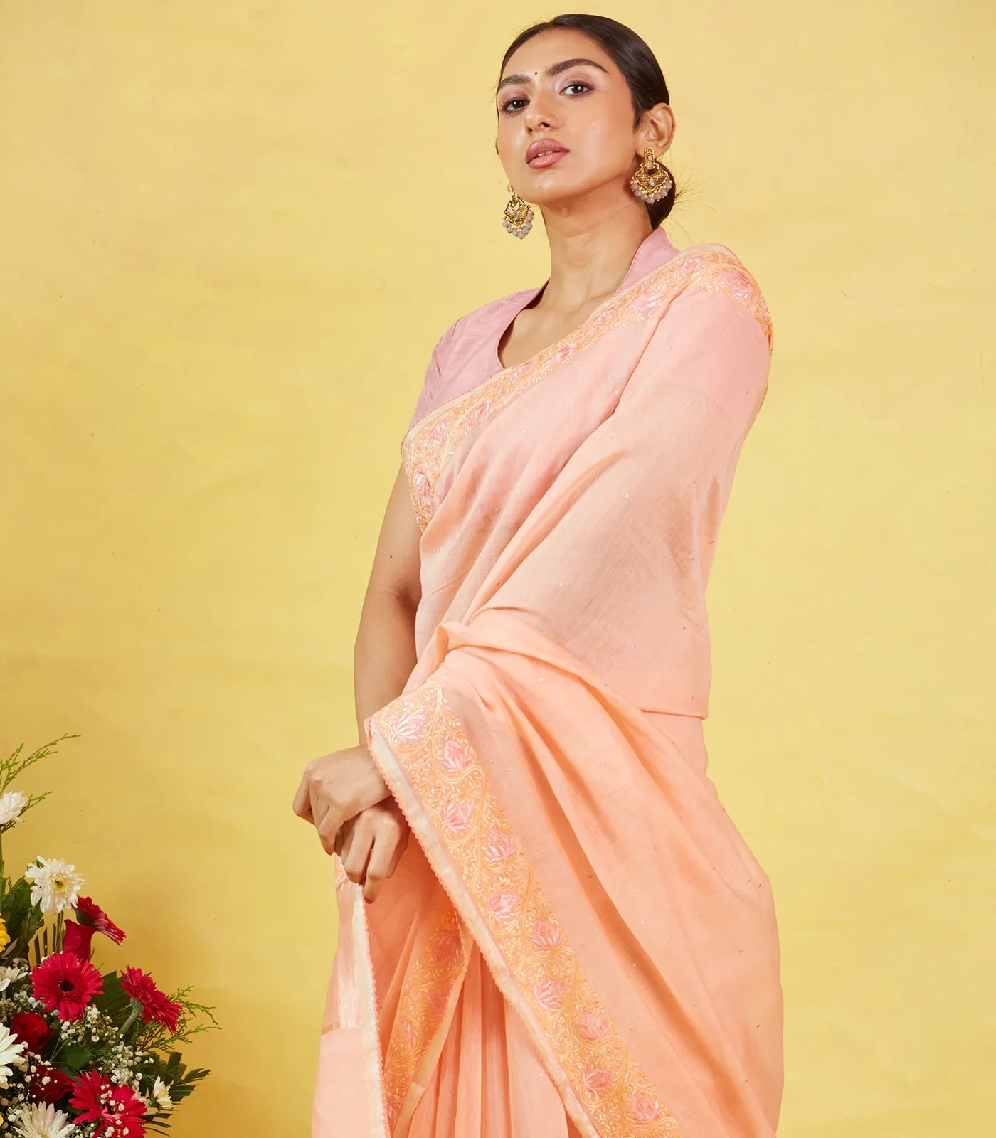 Peach Handwoven Linen Saree Embroidered With Floral Motifs