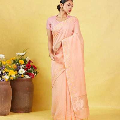 Peach Handwoven Linen Saree Embroidered With Floral Motifs