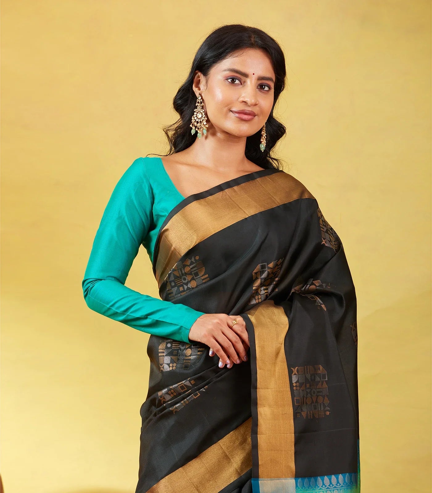 Black Soft Silk Saree With Geometric Buttas And Gold Border