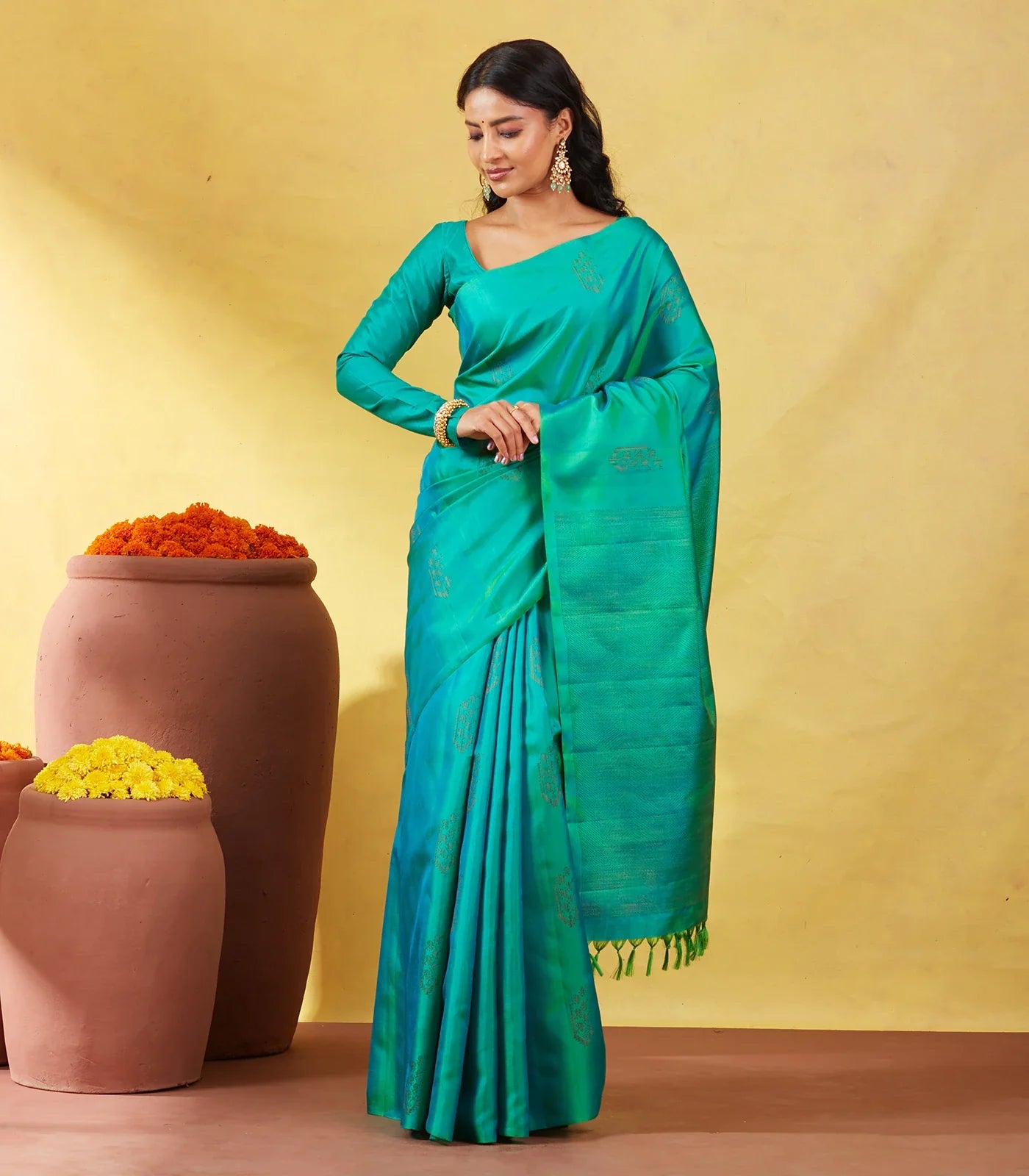 Sea Green Soft Silk Saree With Floral Zari Buttas